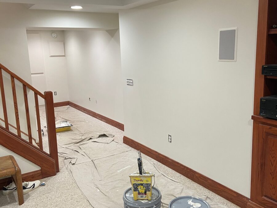 Freshly finished drywall and paint around a staircase