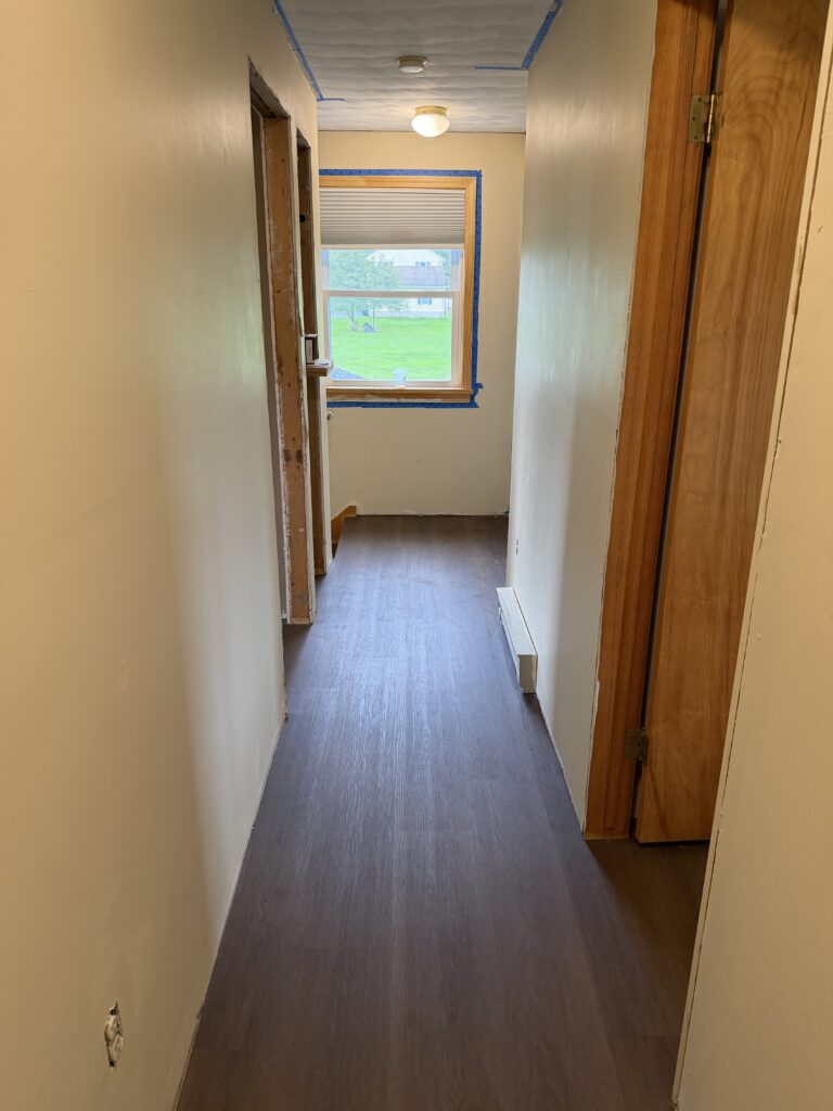 LVP Hallway Flooring — after