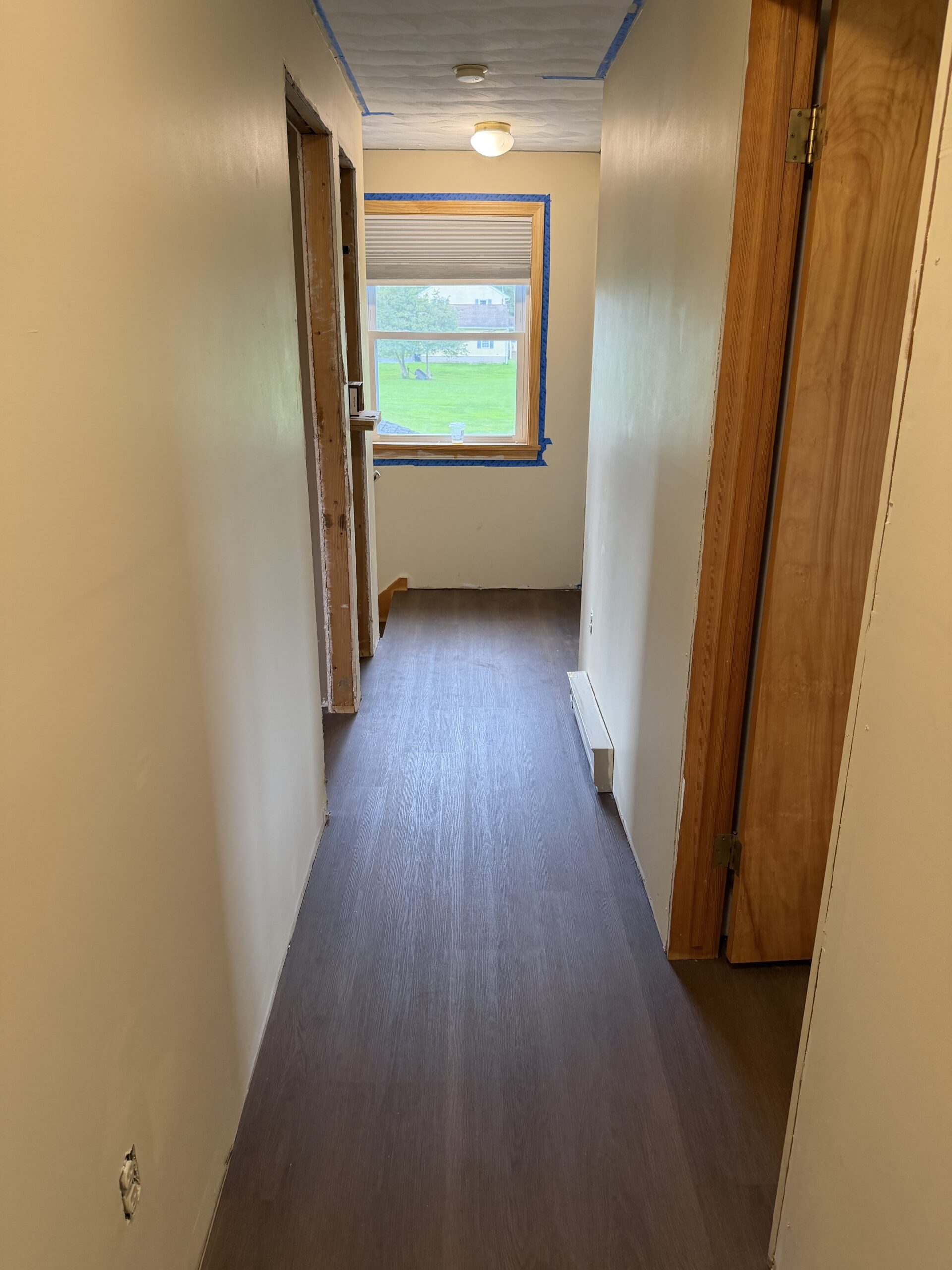 LVP Hallway Flooring — after